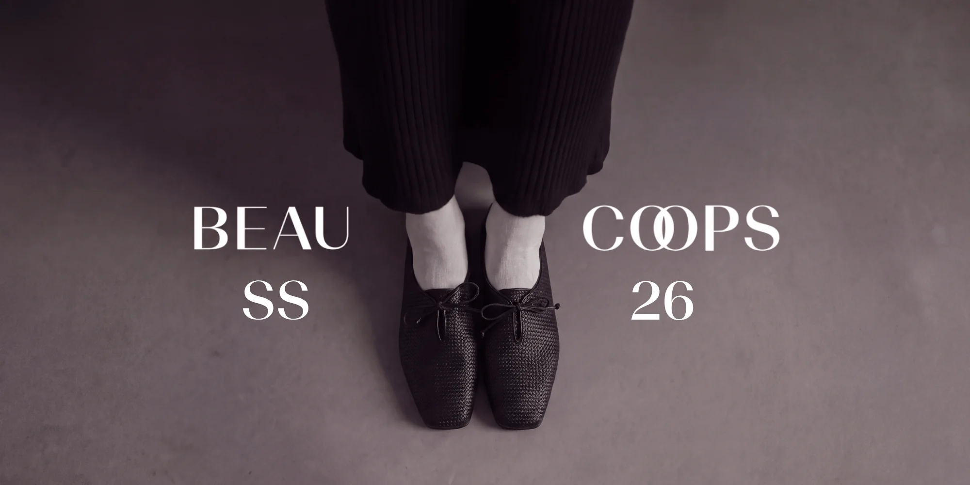 Beau Coops campaign: a close-up of woven leather lace-up flats with ribbon ties, paired with a ribbed knit skirt, reading 'Beau Coops SS 26'.