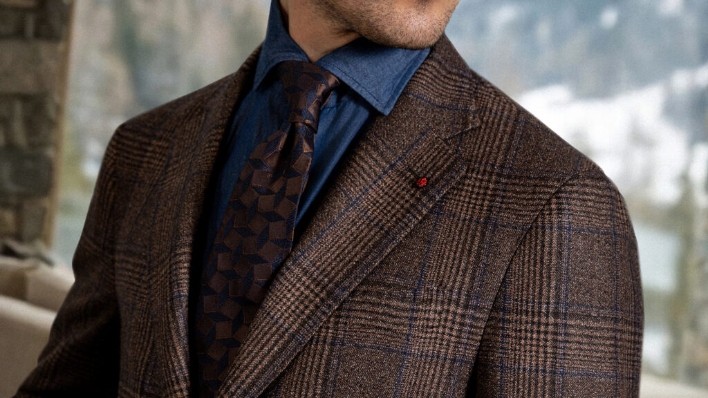 Fugato campaign: a close-up of a checked wool jacket, tie and pocket square detail.